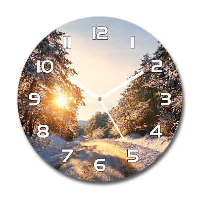 Horloge ronde Route dans la forêt en hiver