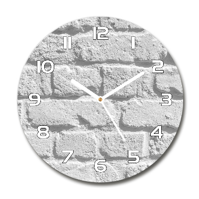 Horloge ronde Grand mur de briques blanches