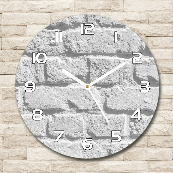 Horloge ronde Grand mur de briques blanches