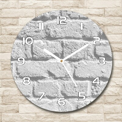 Horloge ronde Grand mur de briques blanches