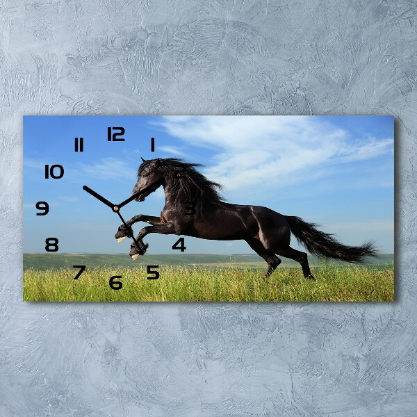 Horloge rectangulaire horizontale Cheval noir dans un pré