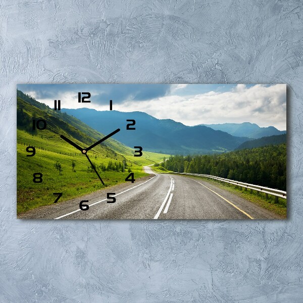 Horloge horizontale Une route dans les montagnes