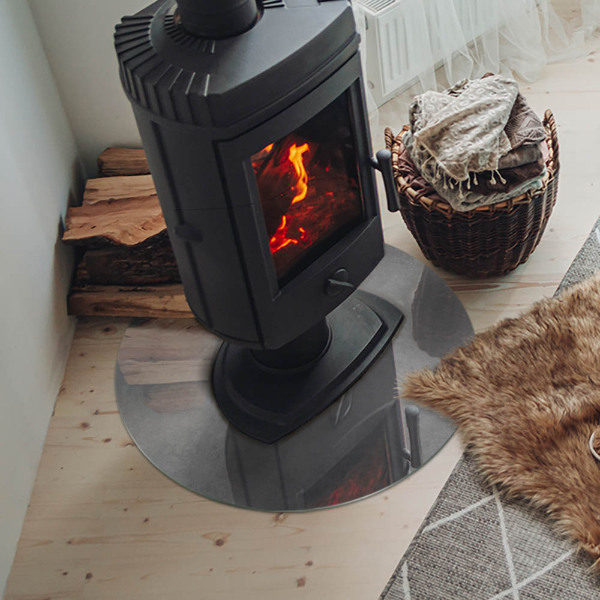 Plaque ronde en verre pour poêle Structure en béton avec effet