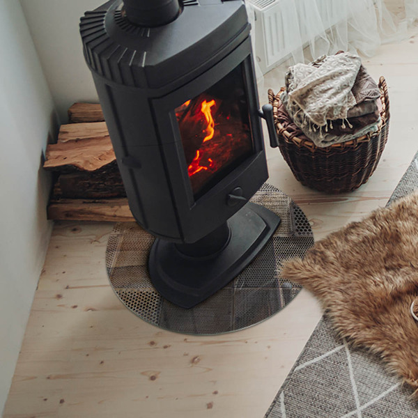 Plaque ronde en verre pour poêle Motif en acier perforé
