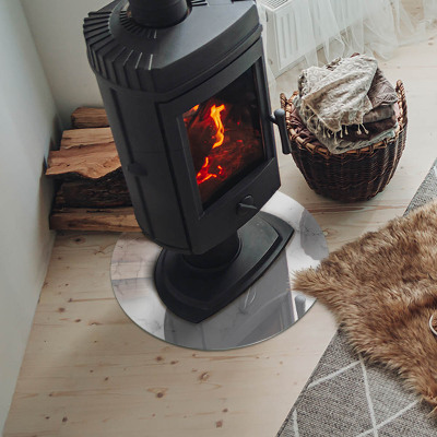 Plaque ronde en verre pour poêle Motif marbré aux veines délicates