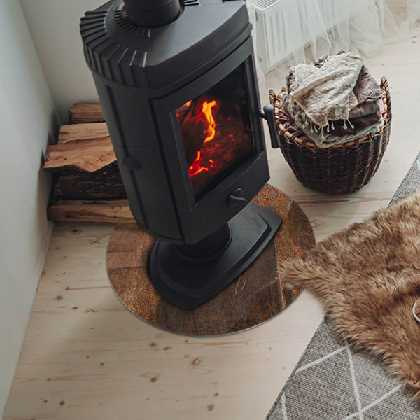 Plaque verre ronde sous poêle Traces de rouille sur une surface métallique