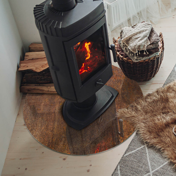 Plaque verre ronde sous poêle Traces de rouille sur une surface métallique