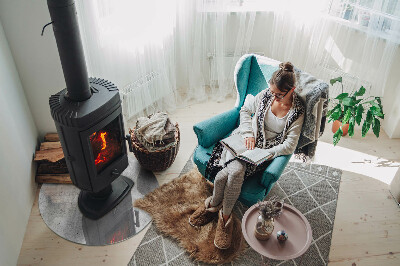 Plaque verre ronde sous poêle structure en béton brut