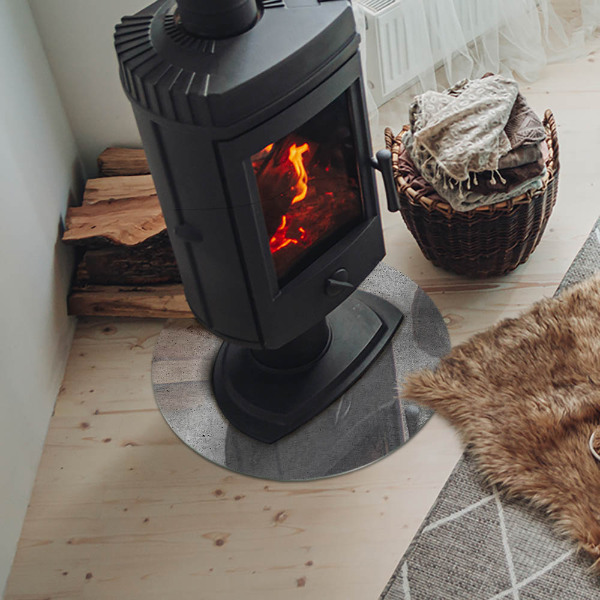 Plaque ronde en verre pour poêle Béton brut dans un style minimaliste