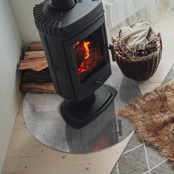 Plaque ronde en verre pour poêle Béton brut dans un style minimaliste