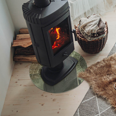 Plaque ronde en verre pour poêle Feuilles tropicales en arrière-plan