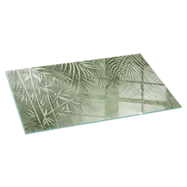 Plaque rectangulaire en verre pour poêle Feuilles tropicales en arrière-plan