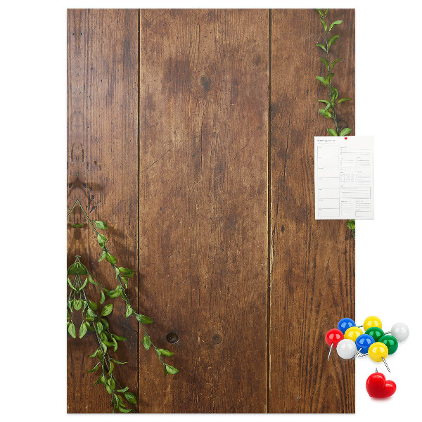 Tableau de liège Bois rustique avec des branches vertes