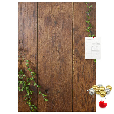 Tableau de liège Bois rustique avec des branches vertes