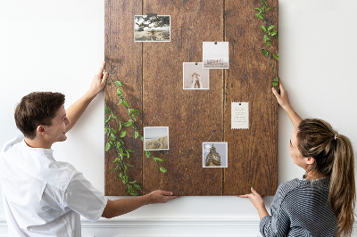 Tableau de liège Bois rustique avec des branches vertes