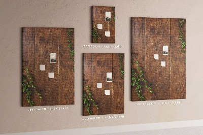 Tableau de liège Bois rustique avec des branches vertes