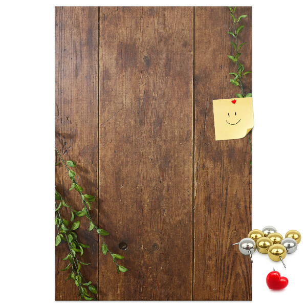 Tableau de liège Bois rustique avec des branches vertes