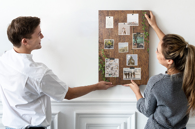 Tableau de liège Bois rustique avec des branches vertes