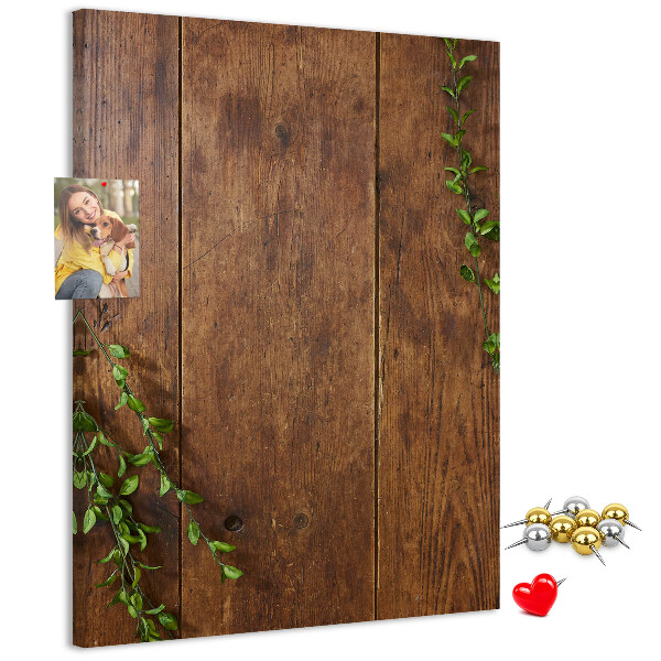 Tableau de liège Bois rustique avec des branches vertes