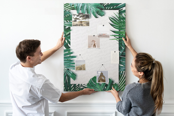 Tableau de liège Feuilles tropicales entourées d'un cadre blanc