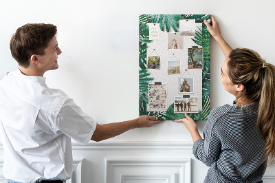 Tableau de liège Feuilles tropicales entourées d'un cadre blanc