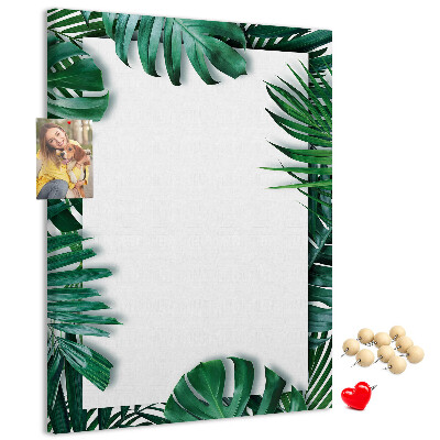 Tableau de liège Feuilles tropicales entourées d'un cadre blanc