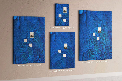 Tableau en liège fantaisie Plumes bleues dans la douce lumière