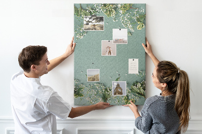 Tableau de liège Fond vert avec des fleurs et des feuilles délicates