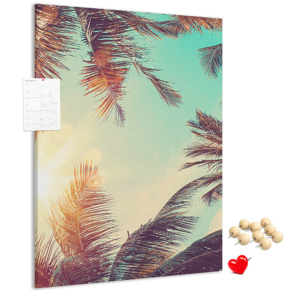 Tableau en liège fantaisie Feuilles de palmier tropicales au soleil couchant