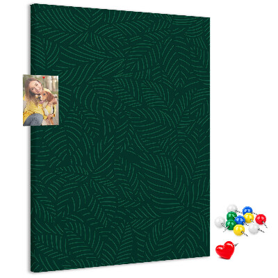 Tableau de liège Fond avec des feuilles sur fond vert foncé