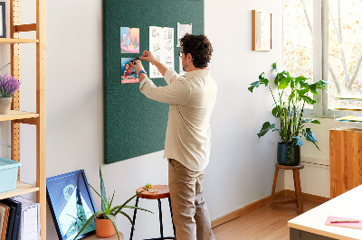 Tableau de liège Fond avec des feuilles sur fond vert foncé