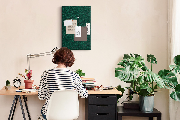 Tableau de liège Fond avec des feuilles sur fond vert foncé