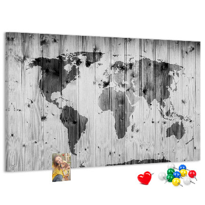 Tableau de liège Une carte du monde sur un fond de planches de bois