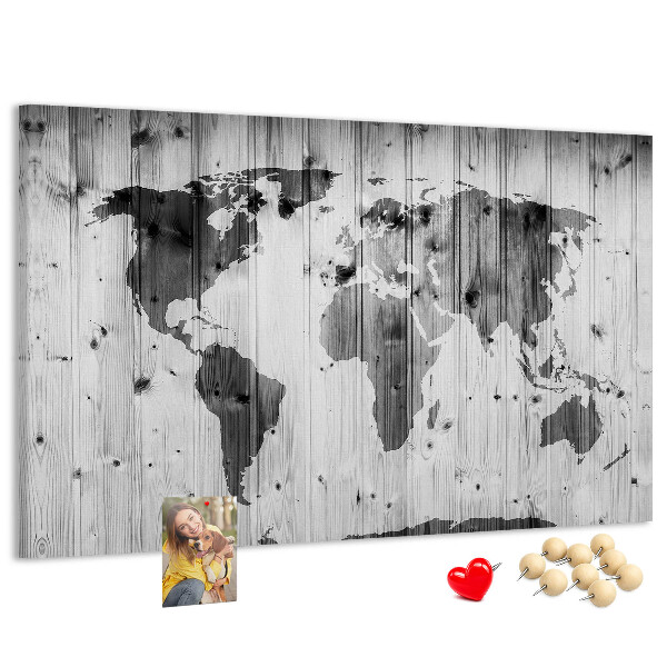 Tableau de liège Une carte du monde sur un fond de planches de bois