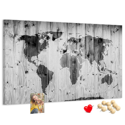 Tableau de liège Une carte du monde sur un fond de planches de bois