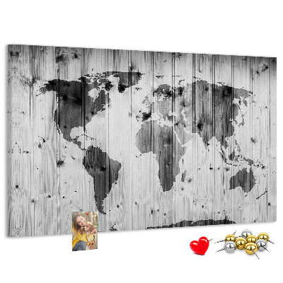 Tableau de liège Une carte du monde sur un fond de planches de bois