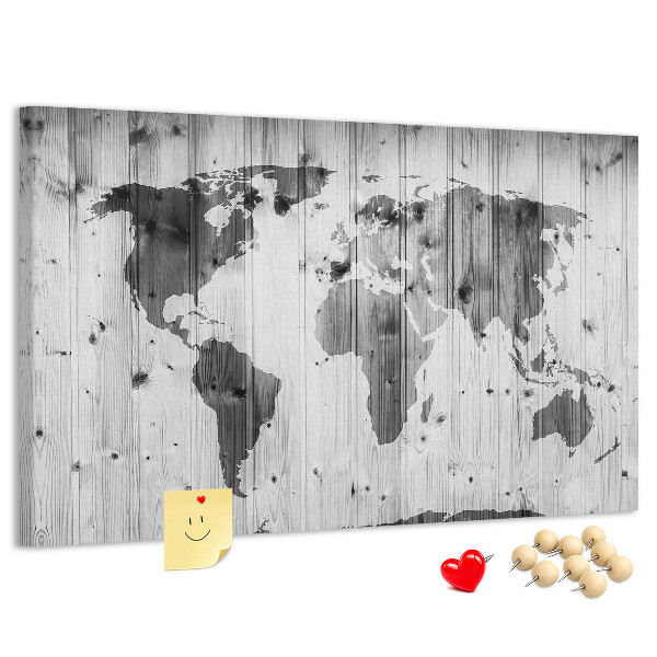Tableau de liège Une carte du monde sur un fond de planches de bois