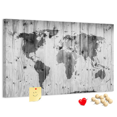 Tableau de liège Une carte du monde sur un fond de planches de bois