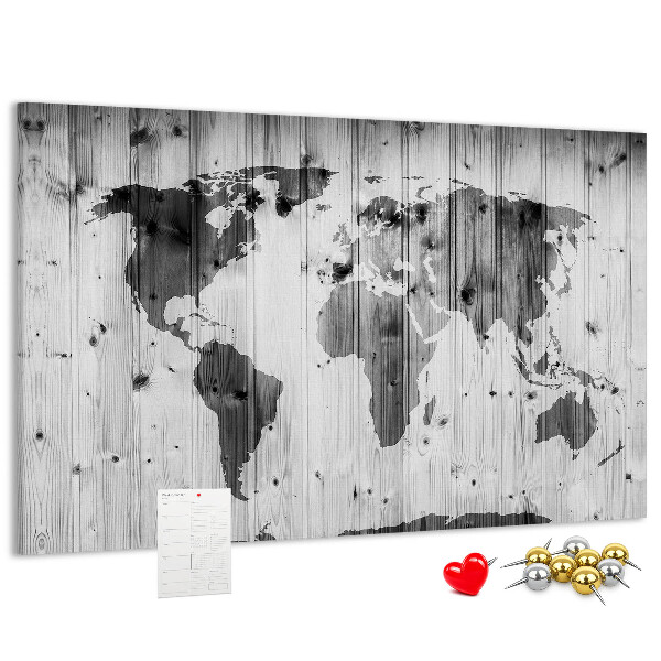 Tableau de liège Une carte du monde sur un fond de planches de bois