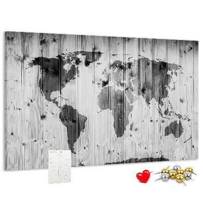 Tableau de liège Une carte du monde sur un fond de planches de bois