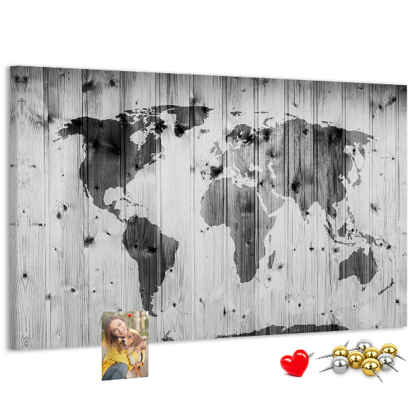 Tableau de liège Une carte du monde sur un fond de planches de bois