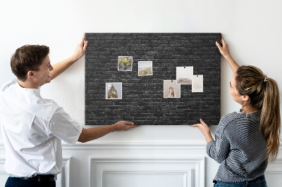 Tableau affichage liège Gros plan sur un mur de briques sombres et texturées