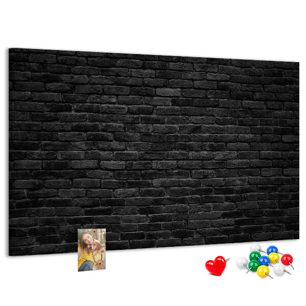 Tableau affichage liège Gros plan sur un mur de briques sombres et texturées