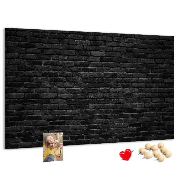 Tableau affichage liège Gros plan sur un mur de briques sombres et texturées