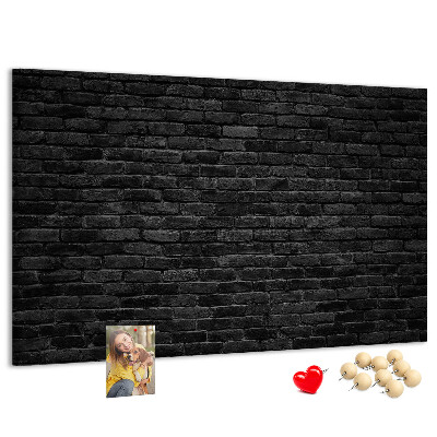 Tableau affichage liège Gros plan sur un mur de briques sombres et texturées