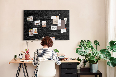 Tableau affichage liège Gros plan sur un mur de briques sombres et texturées