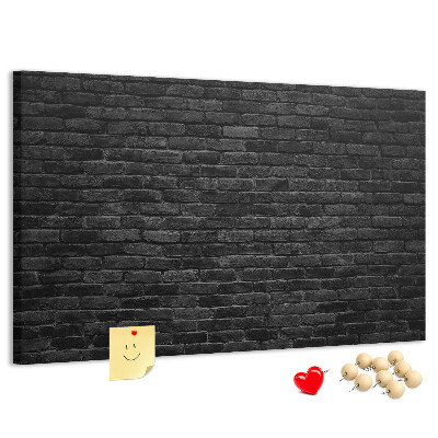Tableau affichage liège Gros plan sur un mur de briques sombres et texturées