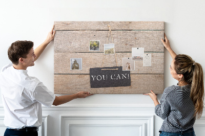 Tableau de liège Motif inspirant sur fond de bois.