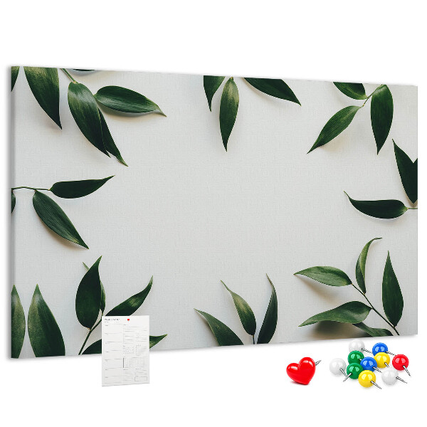 Tableau en liège Feuilles disposées dans un arrangement délicat et minimaliste