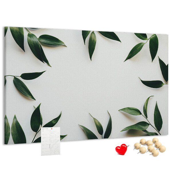 Tableau en liège Feuilles disposées dans un arrangement délicat et minimaliste